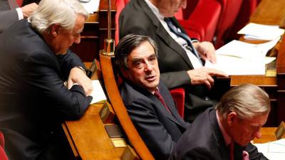Hollande adviser embroiled in Sarkozy and Fillon row