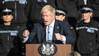 Boris Johnson criticised for using police as backdrop to speech