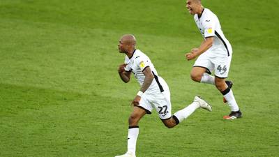 Ayew makes amends for penalty miss to give Swansea advantage