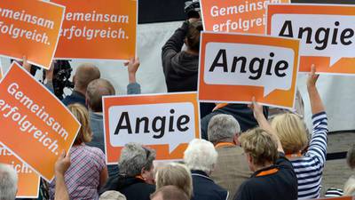 Angela Merkel launches re-election campaign with warning on European debt addiction