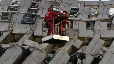 Two men pulled out alive  from rubble after Taiwan earthquake