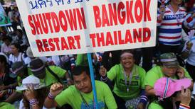Party atmosphere as anti-government protests shut Thai capital