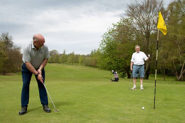 Delighted golfers glad to get back in the swing as curbs lifted