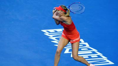 Sharp Maria Sharapova returns to form to reach fourth round