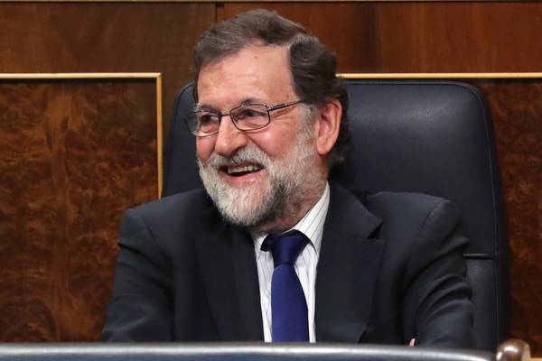 Spanish PM  survives budget test but corruption scandals linger