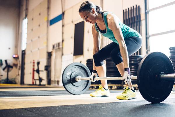 The women using barbells to lift themselves to strength and health