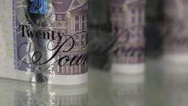 Bank of England keeps interest rates at record low