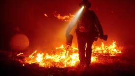 California wildfires: Three dead, 64,000 on verge of evacuation
