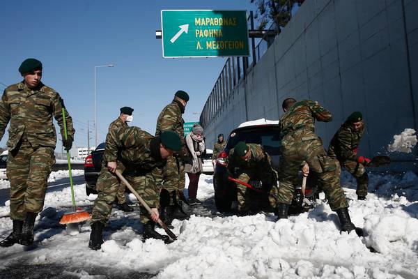 Greek prime minister apologises as thousands are stranded in Athens snow
