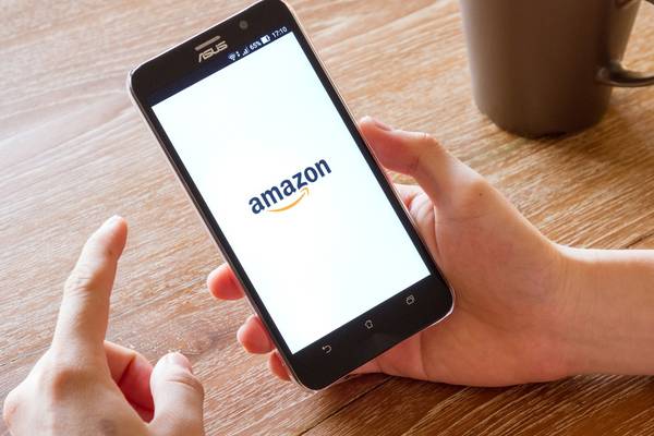 Amazon reaches deal with Visa to accept cards across global network
