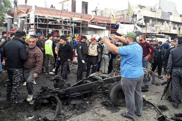 Isis kills at  least 24 in Baghdad car bombing