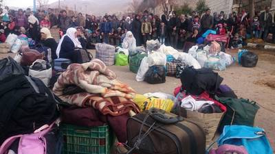 Scenes of desperation as aid convoys enter Syrian towns