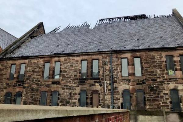 Multi-cultural centre in Belfast used as a food bank damaged in second arson attack