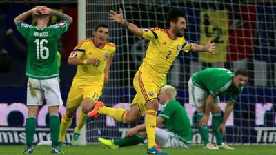 Romania halt Northern Ireland’s charge