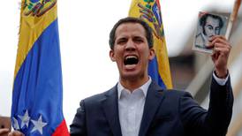 Venezuela’s opposition leader urges military to abandon Maduro