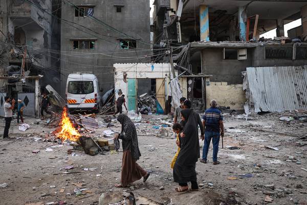 Israeli forces push deeper into Gaza refugee camp as air strikes kill at least five in Rafah