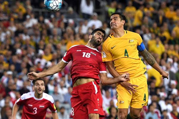 Tim Cahill heads Australia into World Cup playoff