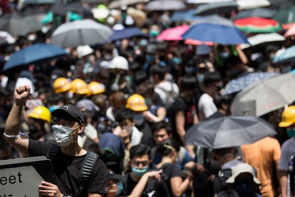 Hong Kong protesters block roads over new extradition Bill