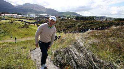 Harrington the star of Royal County Down as  McIlroy cards ugly 80