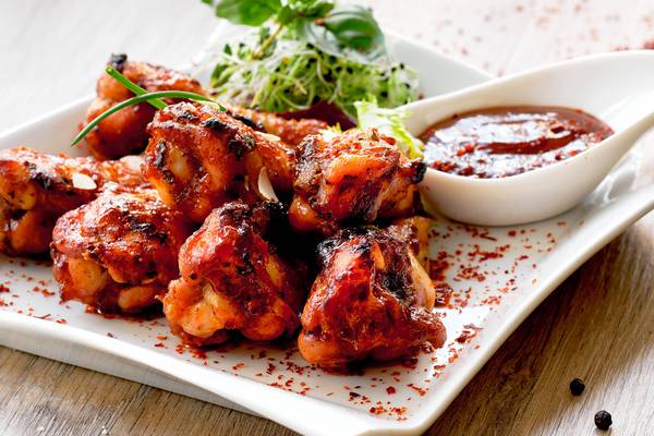 A takeaway favourite to make at home: hot, crispy chicken wings