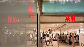 Retailer H&M shares hit record high on upbeat trading data