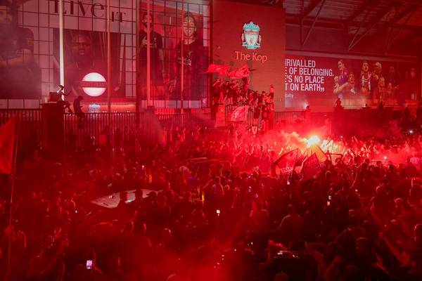 Police warn against thousands of Liverpool fans celebrating at Anfield