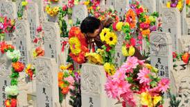 Chinese mark  Tomb Sweeping Day as they honour departed loved ones