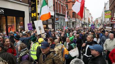 Anti-mask campaigners hold sit-down protest on Grafton Street