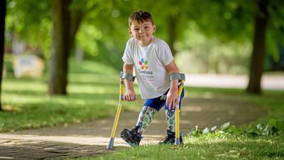 Five-year-old double amputee raises £1m by walking 10km on new legs