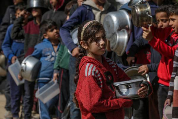 Trapped and starving, two families in Gaza Strip try to keep their children alive