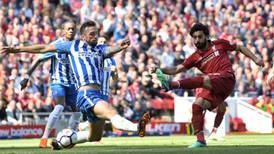 Liverpool make light work of Brighton to secure top four spot