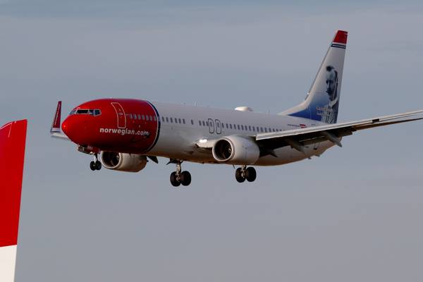 Norwegian Air to cut 4,000 flights, lay off half its employees