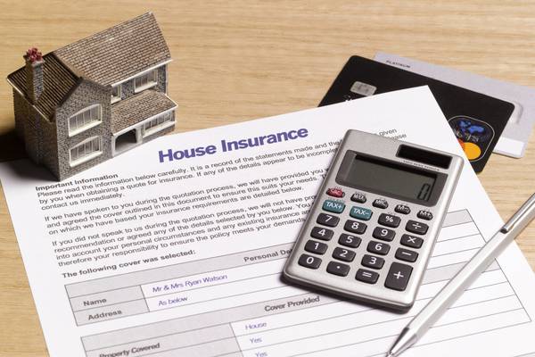 How can I ensure my house insurance will cover the cost of a total rebuild?