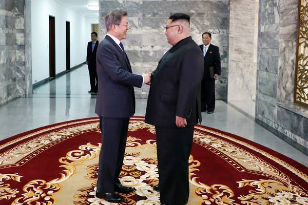 Leaders of two Koreas hold surprise meeting as Trump revives summit hope