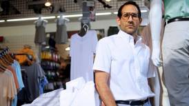 American Apparel fires founder, names new chief executive