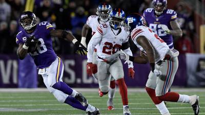 Vikings rout Giants to clinch playoff berth