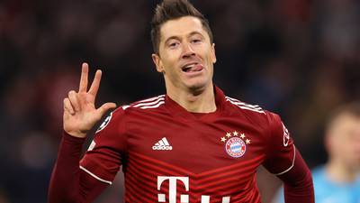 Lewandowski’s historic hat-trick sets Bayern Munich on road to easy win