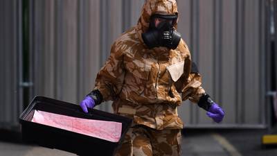 UK police in protective suits investigate latest Novichok poisoning