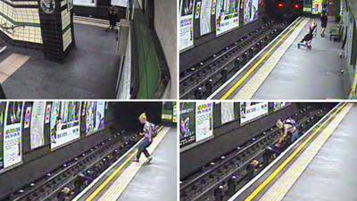 Police seek couple after baby in buggy blown onto Tube tracks
