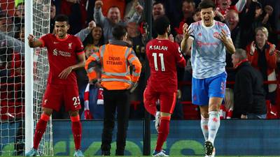 Liverpool go top after Salah leads torment of Man United