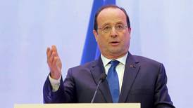 Hollande pledges cuts to taxes and public spending