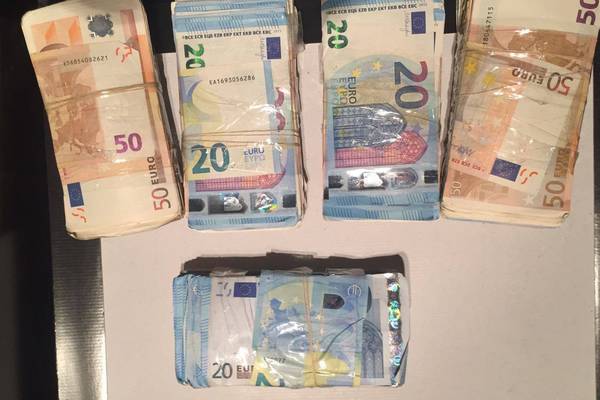 Man arrested after €120,000 cash seized in Garda searches