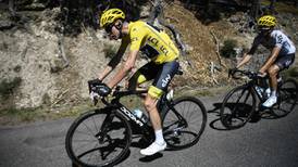 Tour de France: Chris Froome retains yellow jersey despite puncture