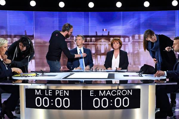 Macron and Le Pen exchange insults in TV election battle