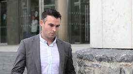 Tyrone footballer had to be restrained after row in pub