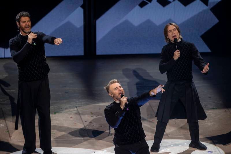 Take That in Dublin review: ‘Whose idea was it to have stairs?’ puffs Gary Barlow as the band roll back the years with dazzling show 