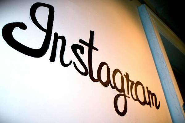 Instagram, now with added news, sails through the flak