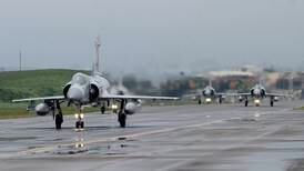 Taiwan scrambles air defences after 20 Chinese military aircraft cross Taiwan Strait