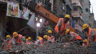 Indian police file homicide case after flyover collapse kills 23