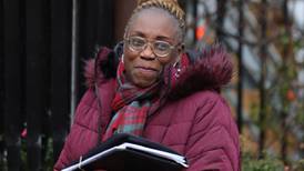 Solicitor claims discriminatory remarks made as she is ‘a woman and a black African’